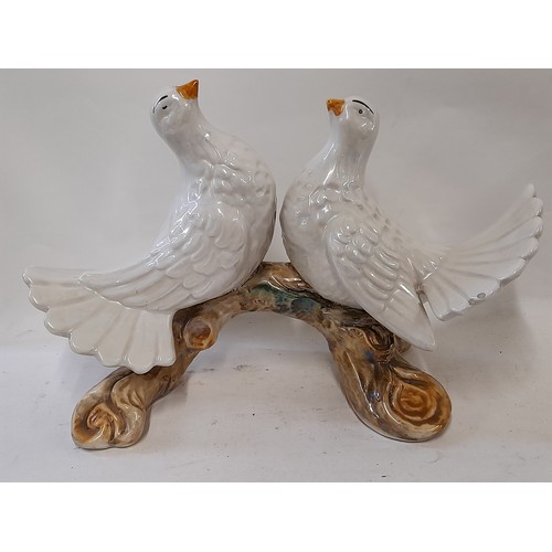 427 - Ceramic Figure of a Pair of Doves with a Lustre finish, 24cm high x 37cm wide