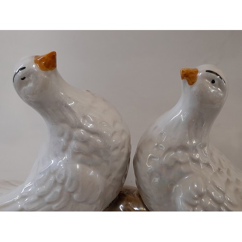 427 - Ceramic Figure of a Pair of Doves with a Lustre finish, 24cm high x 37cm wide