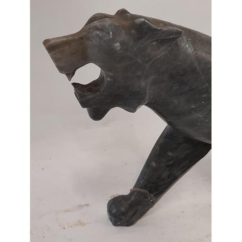 436 - Soapstone Leopard with repairs, 39cm x 16cm