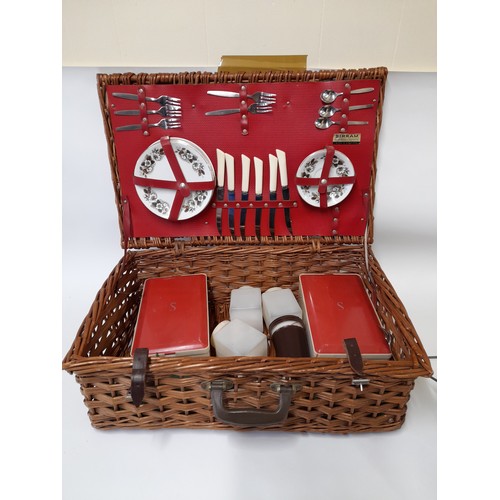 493 - Wicker picnic set with original contents, with a tin tray on folding legs