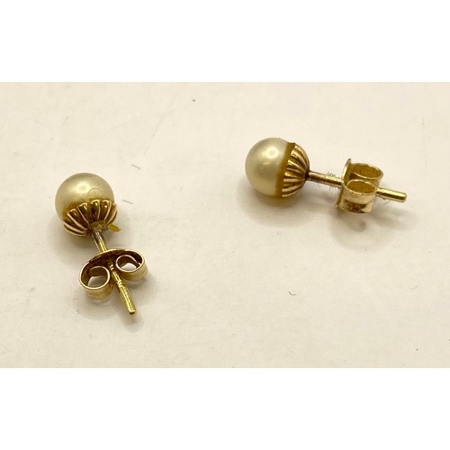 459 - Pair of 9ct Gold Pearl Stud style Earrings in Box. Weight 0.85g