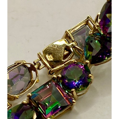 475 - Mystic Topaz Bracelet With 9CT Marking. Weight 12.21g