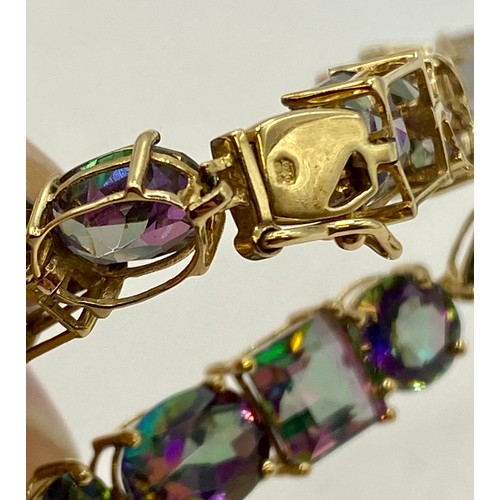 475 - Mystic Topaz Bracelet With 9CT Marking. Weight 12.21g