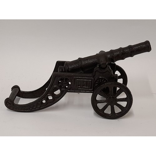 582 - Cast Bronzed Metal cannon, 24cm long