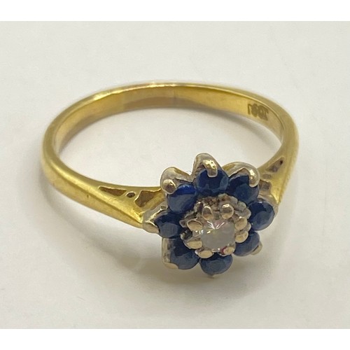 487 - 18ct Gold Diamond and Gemstone Tanzanite/Sapphire? Cluster Ring with Flower Design. Weight 3.11g. UK... 