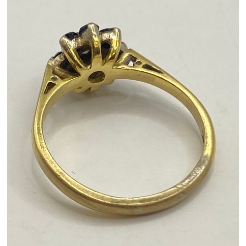 487 - 18ct Gold Diamond and Gemstone Tanzanite/Sapphire? Cluster Ring with Flower Design. Weight 3.11g. UK... 