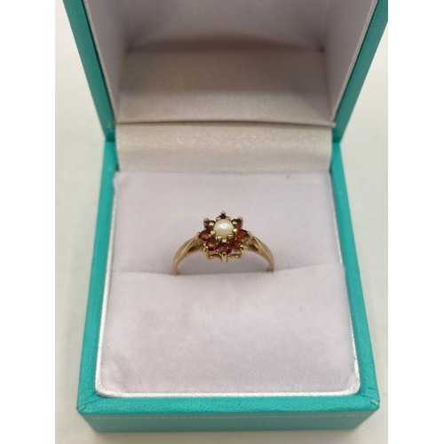 492 - Hallmarked 9ct Gold Flower Decoration Pearl and Gem Stone Cluster Ring in Box. Weight 1.33g. UK Size... 