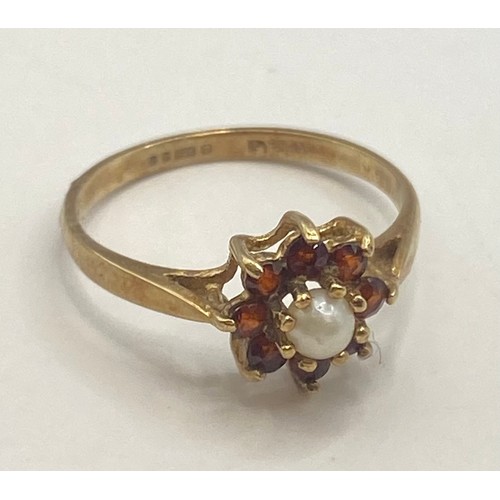 492 - Hallmarked 9ct Gold Flower Decoration Pearl and Gem Stone Cluster Ring in Box. Weight 1.33g. UK Size... 