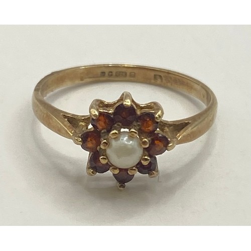 492 - Hallmarked 9ct Gold Flower Decoration Pearl and Gem Stone Cluster Ring in Box. Weight 1.33g. UK Size... 