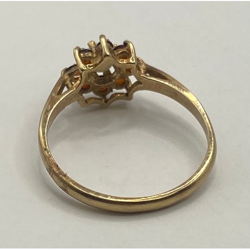 492 - Hallmarked 9ct Gold Flower Decoration Pearl and Gem Stone Cluster Ring in Box. Weight 1.33g. UK Size... 