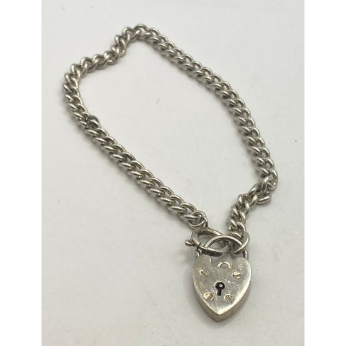 494 - Sterling Silver Gemstone Decorated Clasp Bracelet Along With a Sterling Silver Lock Heart Pendant Br... 