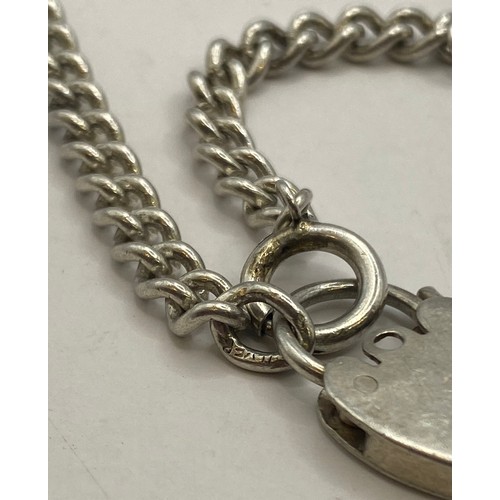 494 - Sterling Silver Gemstone Decorated Clasp Bracelet Along With a Sterling Silver Lock Heart Pendant Br... 