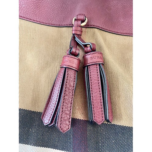 503 - Genuine Burberry London England Ashby Burgundy Red Tassle Handbag. Roughly 40cm x 36cm