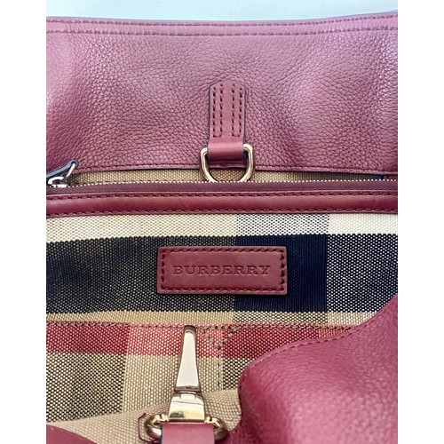 503 - Genuine Burberry London England Ashby Burgundy Red Tassle Handbag. Roughly 40cm x 36cm