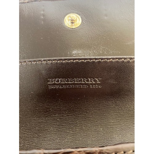 509 - Genuine Burberry London Burberry Check and Leather Purse. Roughly 20cm x 10cm