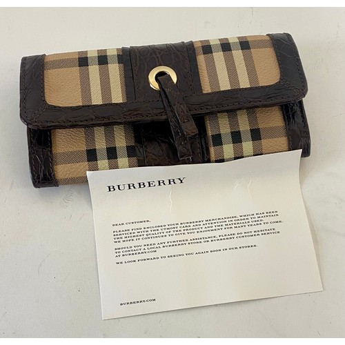 509 - Genuine Burberry London Burberry Check and Leather Purse. Roughly 20cm x 10cm