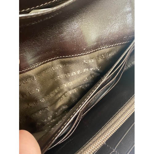 509 - Genuine Burberry London Burberry Check and Leather Purse. Roughly 20cm x 10cm