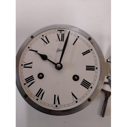 388 - Chrome Ships Bulk Head Clock By Schatz with Key. 18CM diameter