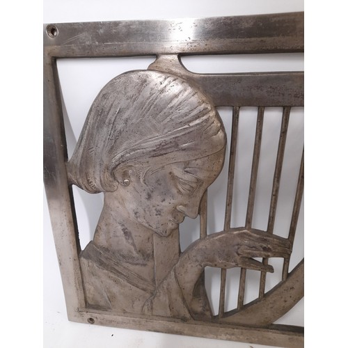 519 - Heavy Metal Grill / Plaque depicting a Woman Playing a Lyre Harp, 32cm x 32cm