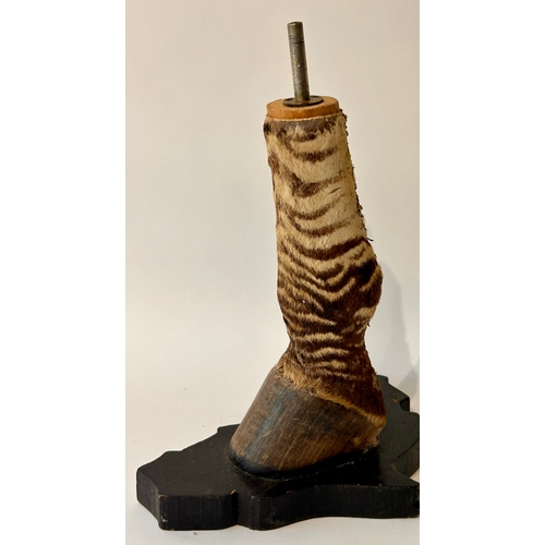 443 - Taxidermy Foot of a zebra on wooden stand In The Form Of A Lamp. 35cm x 25cm x 19cm.