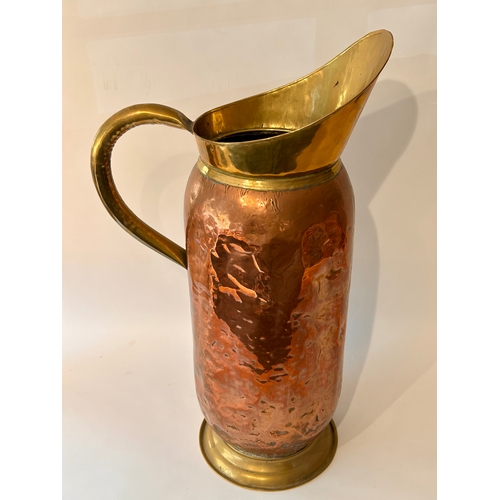 447 - Large Copper And Brass Jug / Stick Stand . 67cm x 40cm.