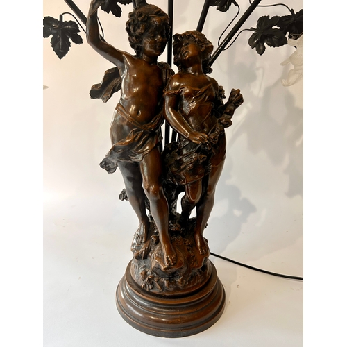 539 - Large Five Branch Bronzed Composite Lamp Of Two Young Lovers . 90cm x 59cm.