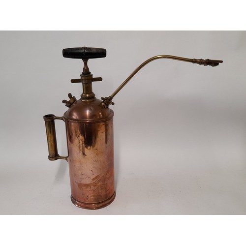 574 - Vintage Copper 'MURATORI' Paris Sprayer/extinguisher 58cm high, and a Copper and Brass Garden Spraye... 