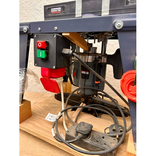 711 - Used in working order 240volt Rockworth Powertask Router bench with jack lifted Router.