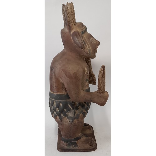 586 - Mexican Terracotta figure of a Corn God, 46cm high x 23cm wide