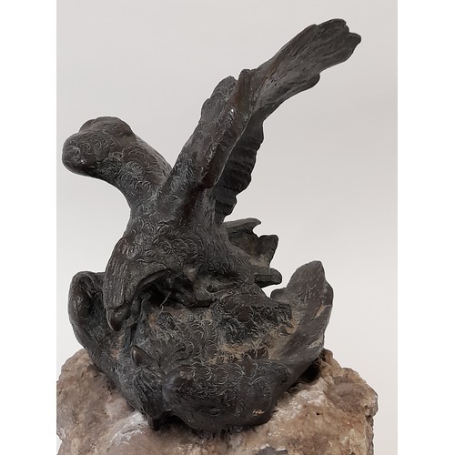 595 - Antique Bronze Figure of 2 Birds of Prey Fighting on a Rock Plinth, 34cm high x 21cm wide