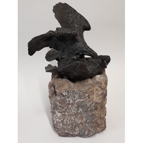 595 - Antique Bronze Figure of 2 Birds of Prey Fighting on a Rock Plinth, 34cm high x 21cm wide