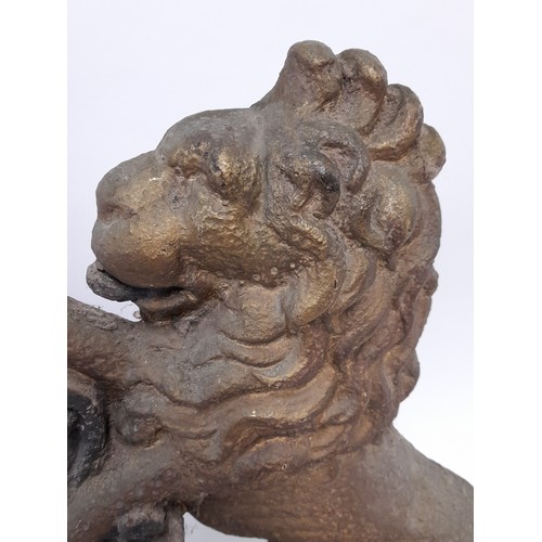 596 - Cast Iron Door Stop in the form of a Rampant Lion in Gold Paint, 37cm high x 25cm wide x 7cm deep