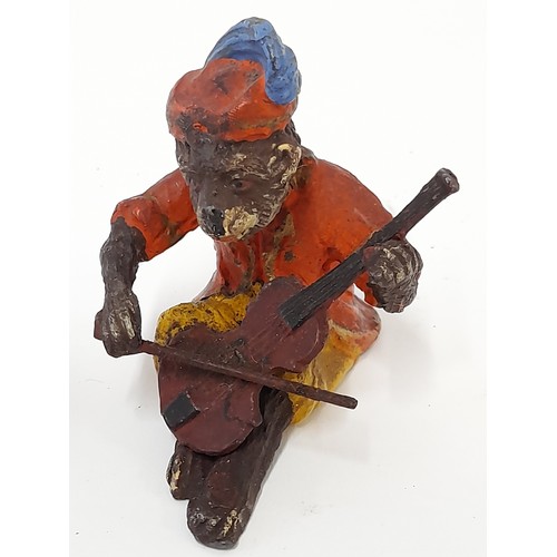 608 - A Cold Painted Monkey Figure With Sprung head Playing A Cello, 7cm high