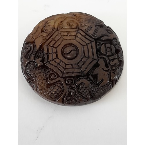 615 - Two Oriental Hardstone Carved Discs, Largest 7cm diameter