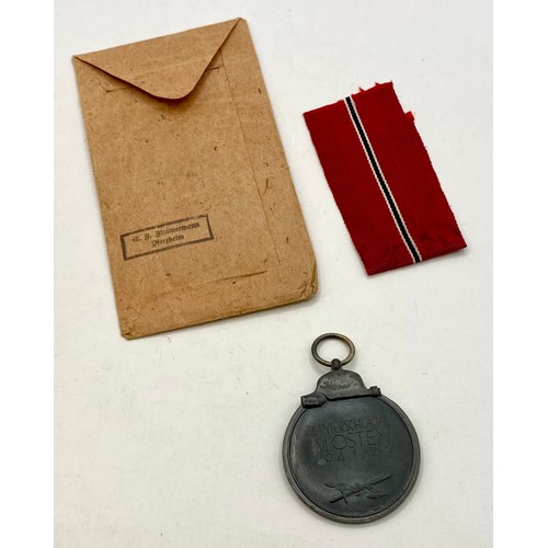 630 - German WW2 Eastern Front Medal With Envelope 5cm x 4.5cm