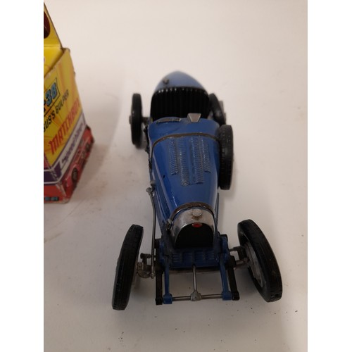 598 - 1 x Boxed Matchbox Speed King Gus's Gulper in box and a vintage Blue open top racing car (2)