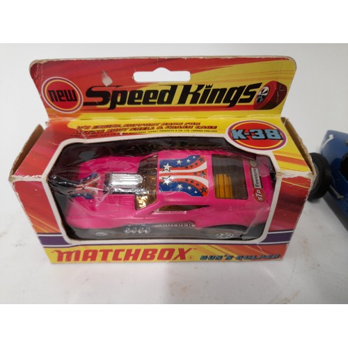 598 - 1 x Boxed Matchbox Speed King Gus's Gulper in box and a vintage Blue open top racing car (2)