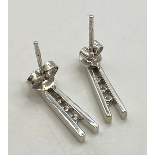 493A - Pair of 18ct White Gold Diamond Earrings. Weight 2.89g