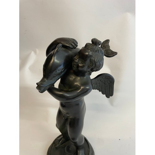 132 - Bronze Putto With Dolphin Figure. 25 cms High