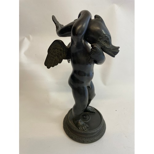 132 - Bronze Putto With Dolphin Figure. 25 cms High