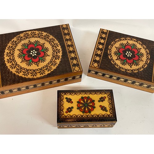 147 - Three Decoratively Carved And Coloured Boxes. Largest 23 x 16.5 x 7 cms (3)