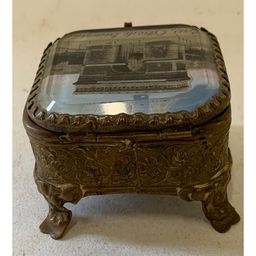 66 - A Vintage Souvenir Trinket Jewellery Box In Gilt Brass And Having A Glass Top With Arc de Triomphe D... 