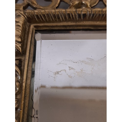 636 - Brass cast framed Mirror in Florentine style with Bevelled glass mirror, 34cm x 17cm