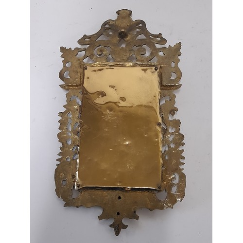 636 - Brass cast framed Mirror in Florentine style with Bevelled glass mirror, 34cm x 17cm