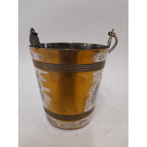 639 - Small Brass Wine Cooler with remains of Silver Plate, 13cm high plus swing handle