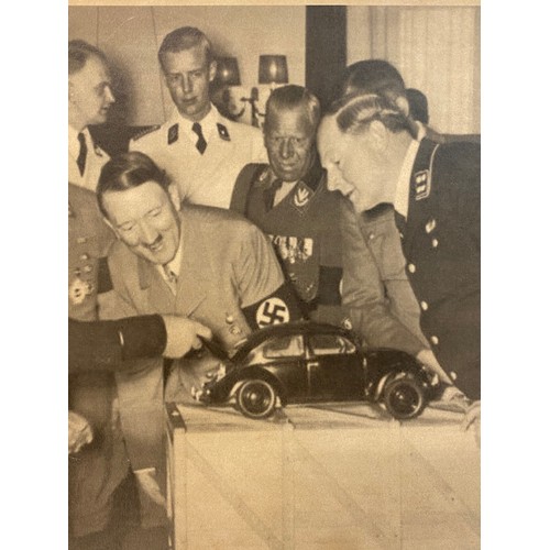 653 - German Military Propaganda Card Poster of Hitler Inspecting a Model Car. Stamped to Back. 42cm x 29.... 