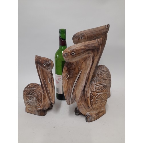 684 - 3 x Wood Carved Pelicans, Brown, largest 30cm high