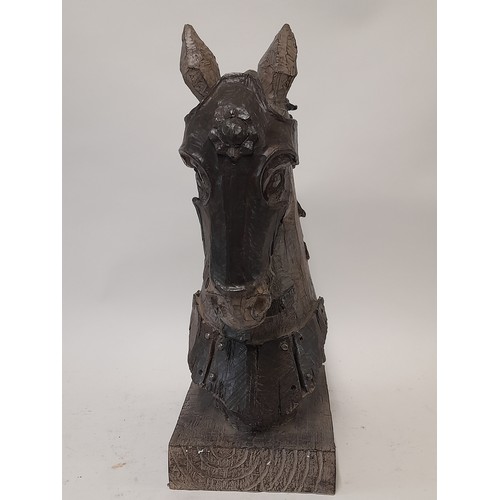 690 - Ornamental Figure of a Horse Plastic with Wood effect Finish, base 20cm x 16cm standing 42cm high