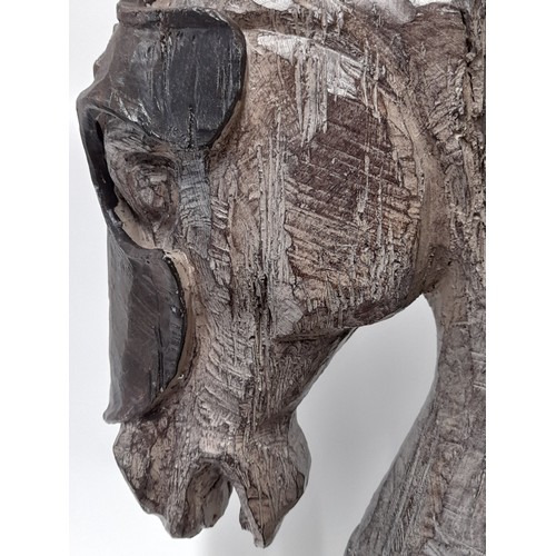 690 - Ornamental Figure of a Horse Plastic with Wood effect Finish, base 20cm x 16cm standing 42cm high