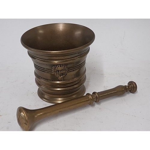 57 - Bronze Pestle 19cm long and Mortar 10cm high,